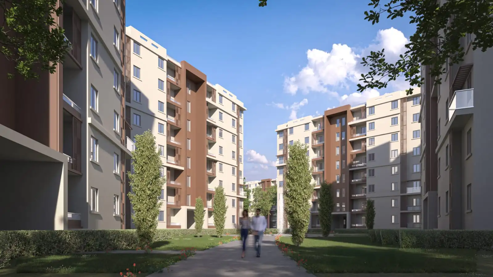 Landscaped pedestrian street between apartment buildings at T Residences New Alamein